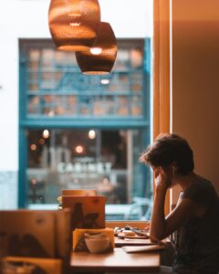 student studying near window